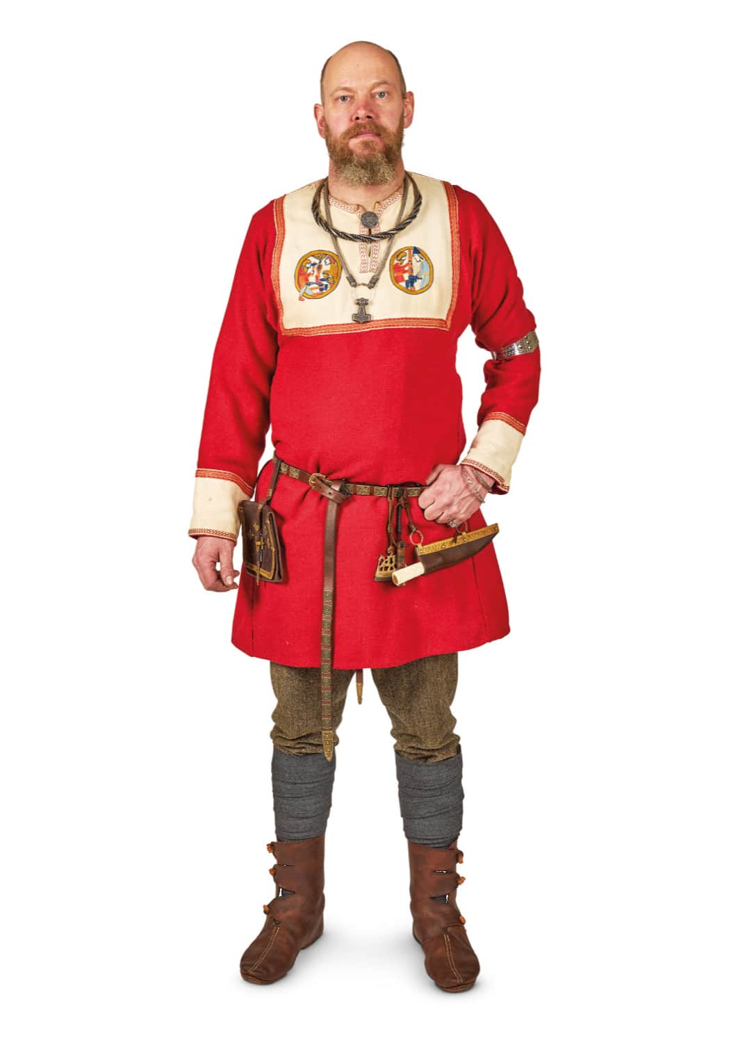 The image shows a Viking man dressed in elaborate clothes